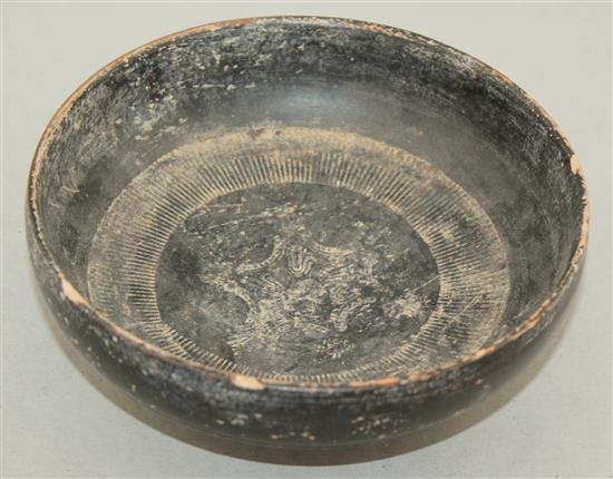 A Greek blackware rouletted bowl, Apulia c 4th century B.C., 17.5cm